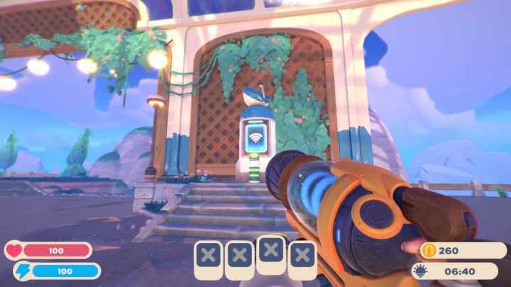 Slime Rancher 2'deki mesaj kioskuna bakan bir oyuncu.