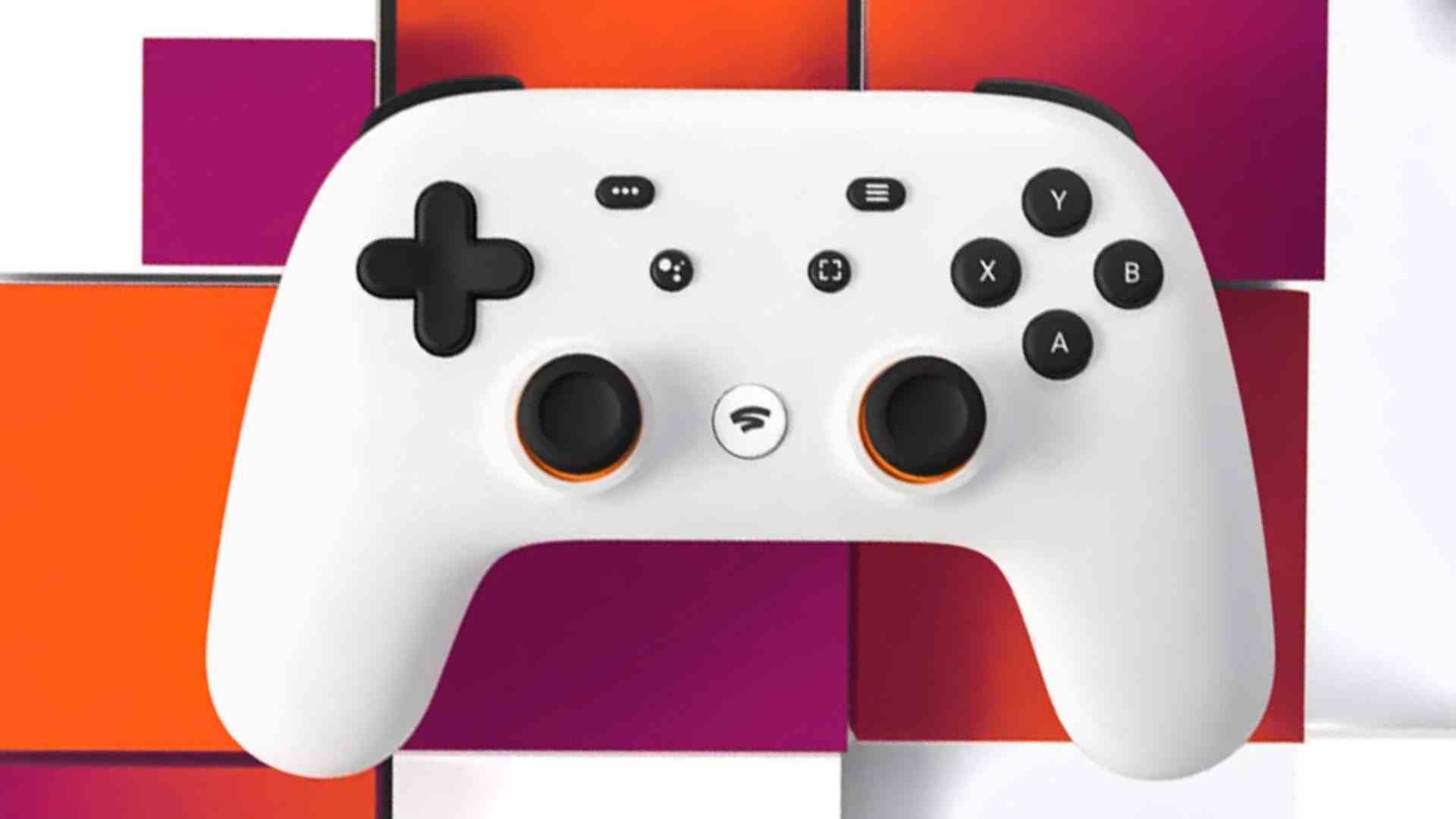 Markalı kare arka plana sahip Google Stadia kumandası