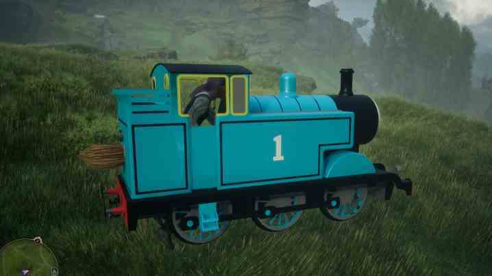 Thomas'ı tren lokomotifine süren bir büyücü.