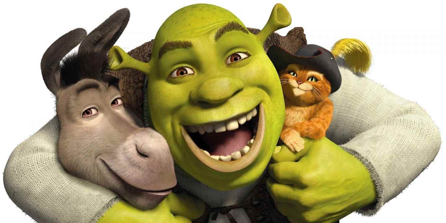 Shrek, Eşek ve Çizmeli Kedi'ye sarılıyor