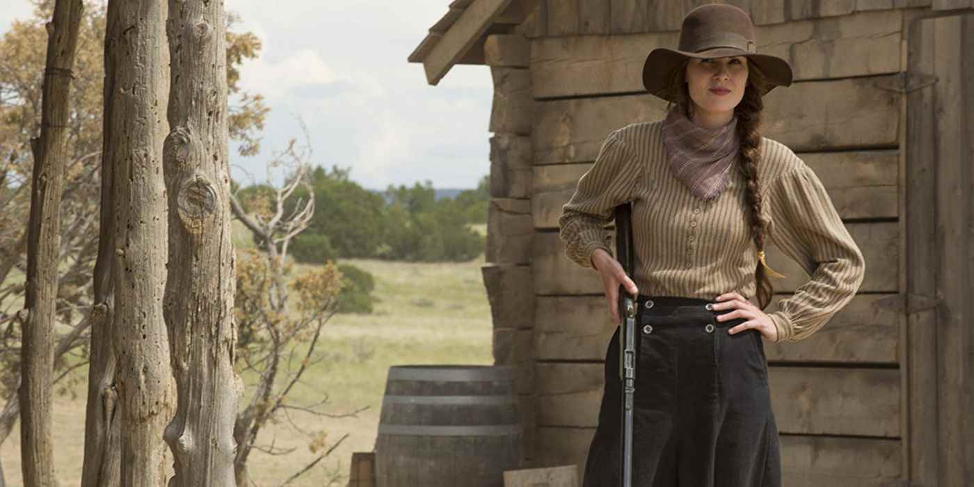 Godless'ta bir tüfek tutan Michelle Dockery