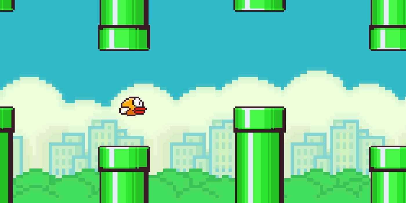 İki yeşil boru arasında uçan flappy bird'ün ekran görüntüsü