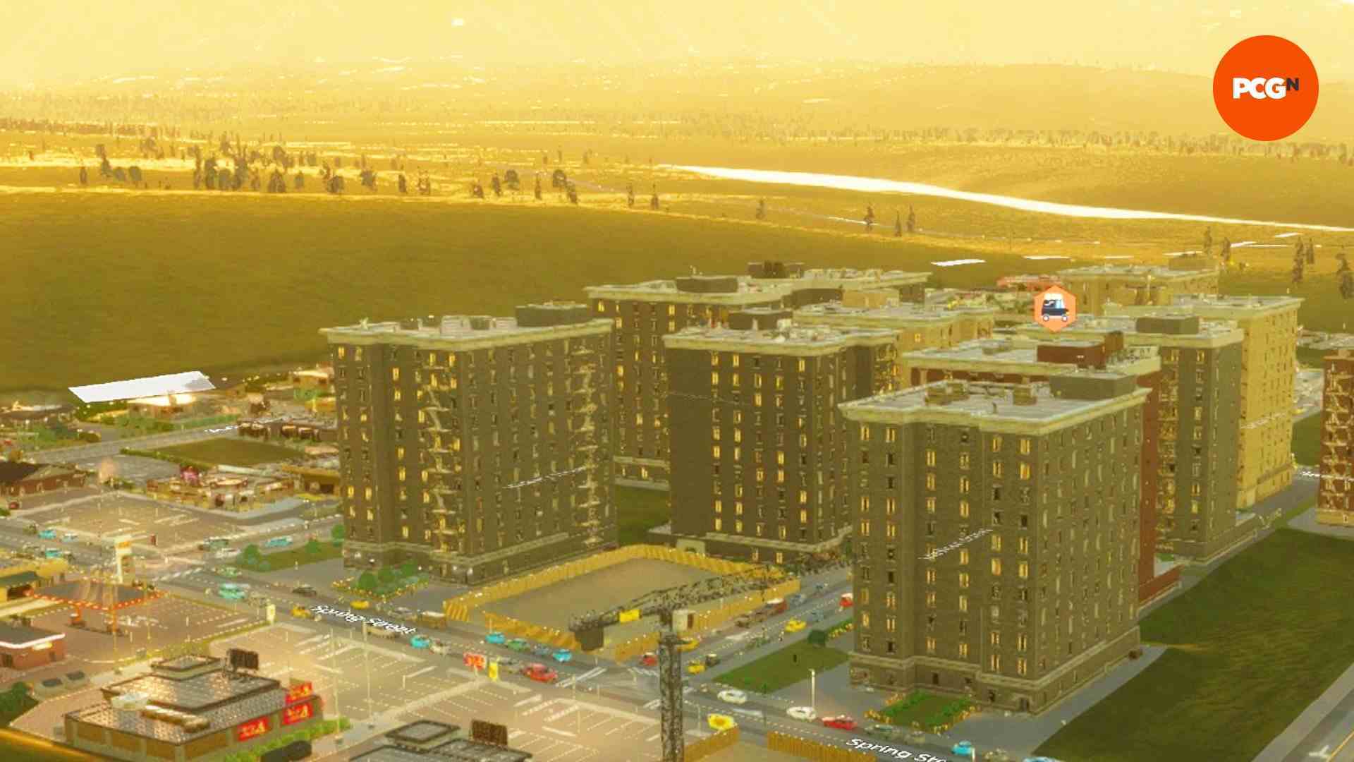 Cities Skylines 2 incelemesi: Şehir kurma oyunu Cities Skylines 2'de küçük bir kasabanın üzerinde gün batımı