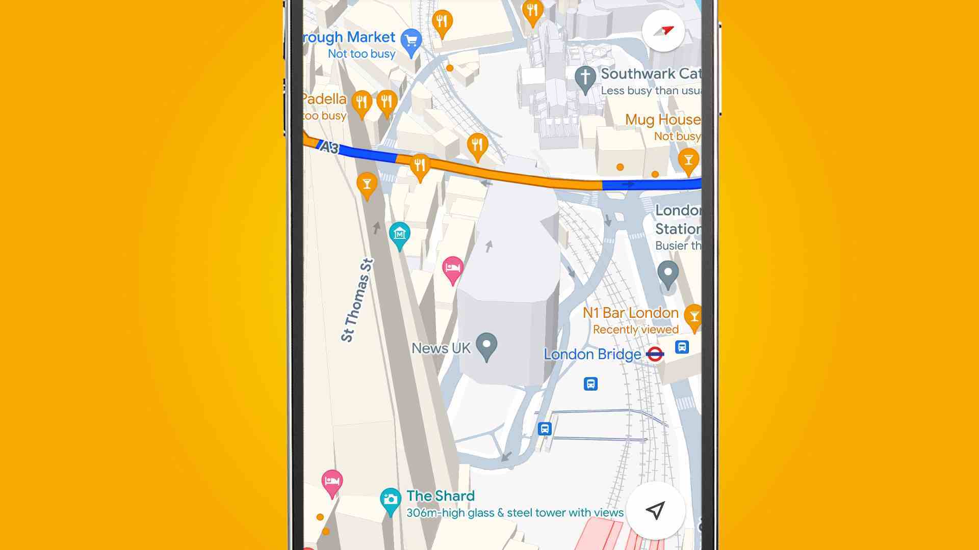 Google Haritalar uygulamasındaki 3D binaları gösteren turuncu arka planlı bir telefon